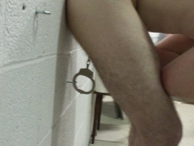 Balls Cuffed to Wall