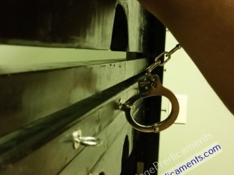 Gay Bondage Sub Cuffed Balls to Wall