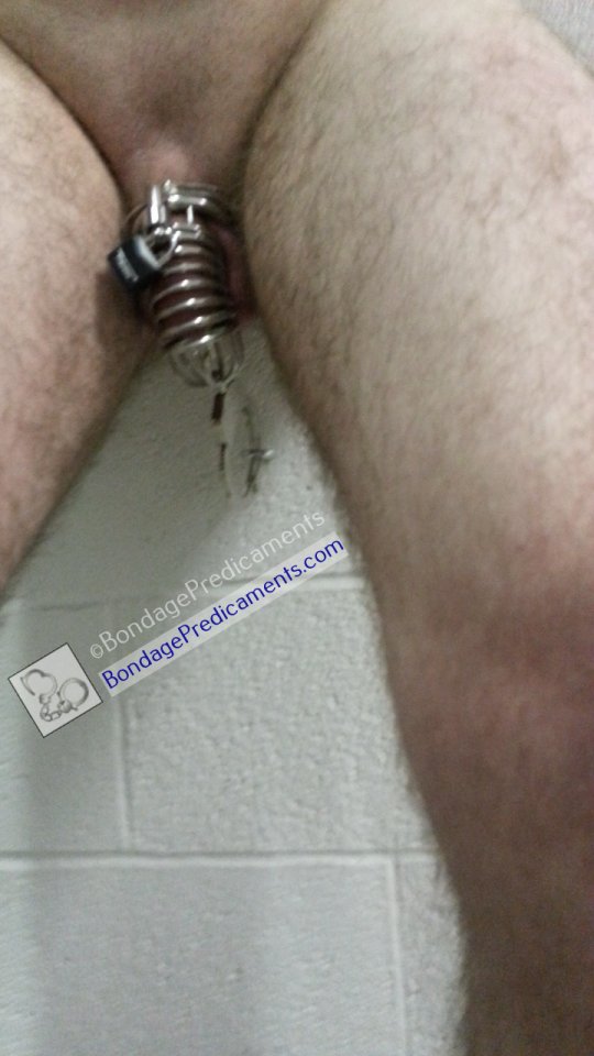 Balls Cuffed to Wall