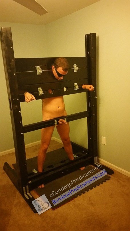 Gboy Locked in Stocks Cock Hard